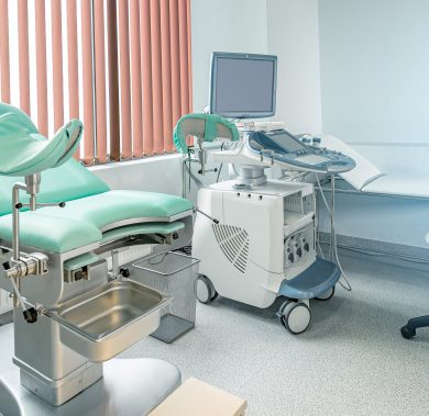 Gynecological chair in gynecological room. Modern gynecological office interior