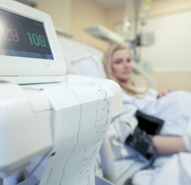 Pregnant woman in the hospital, measuring a blood pressure, preparation to childbirth, healthy pregnancy concept